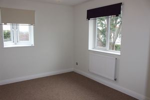 Bedroom One- click for photo gallery